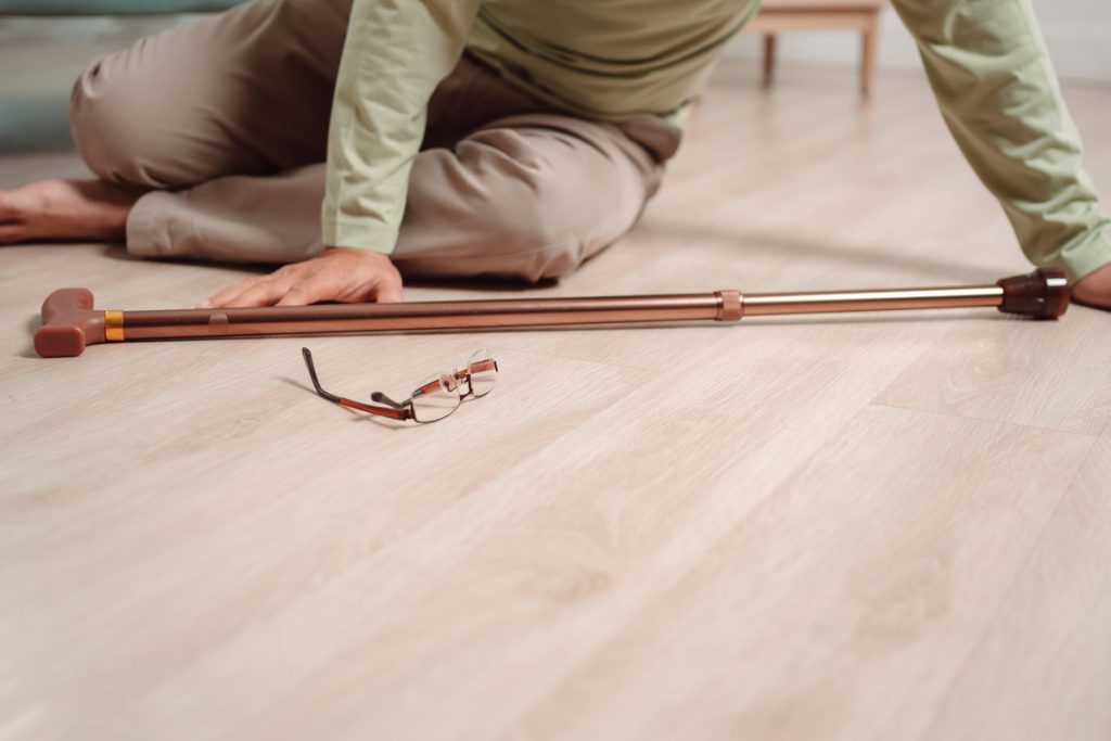 Asian senior man falling on the ground with walker in living room at home. Elderly older mature male having an accident heart attack for emergency help support from hospital. Insurance health care. | Pension de reversion téléassistance