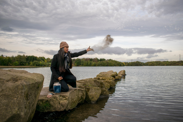 Sad Female Scattering The Cremated Ashes Of A Loved One From A F | Pension de reversion