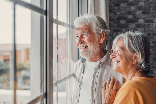 Happy bonding loving middle aged senior retired couple standing | Pension de reversion