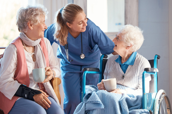 Nursing home care and nurse with senior women doing healthcare checkup examination or consultation Medical conversation and elderly woman in wheelchair consulting a doctor at retirement facility | Pension de reversion placement EHPAD